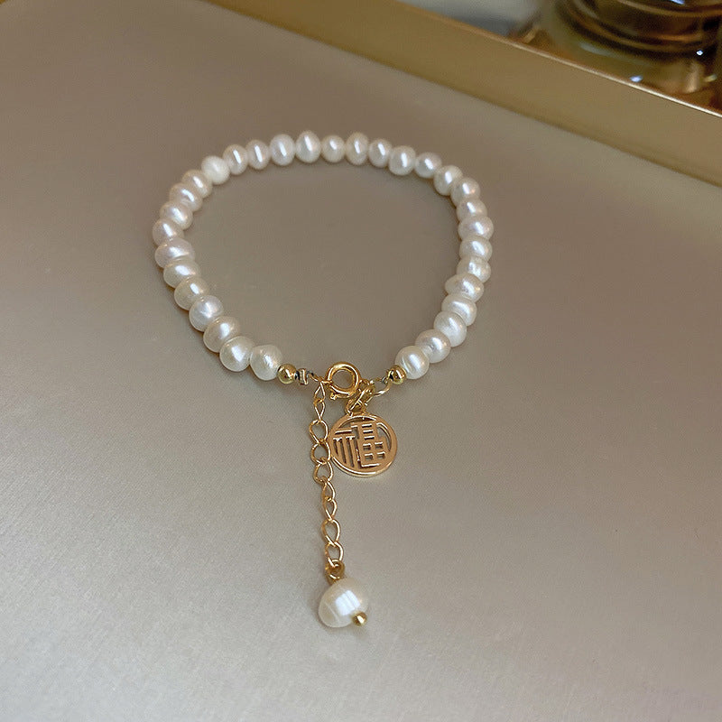 Wholesale Beaded Ceramic Lucky Cat Forwarding Pearl Crystal Bracelet